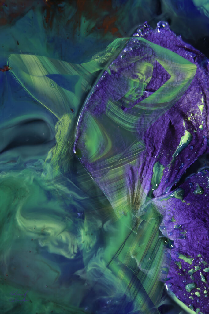 Abstract green and purple marbled paint texture